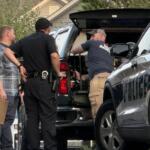 SBI and Asheville Police Department officers investigate the scene Thursday, Aug. 27, 2026, on Nancy Street after an officer-involved shooting left a man dead.