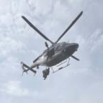 A North Carolina State Highway Patrol helicopter takes part in the rescue of a hiker who fell about 50 feet at Grandfather Mountain.