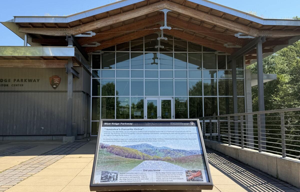 The Blue Ridge Parkway Visitor Center near Asheville features exhibits about the Parkway's natural and cultural history. A leaked National Park Service database identifies some Blue Ridge Parkway signs and interpretive exhibits for review.