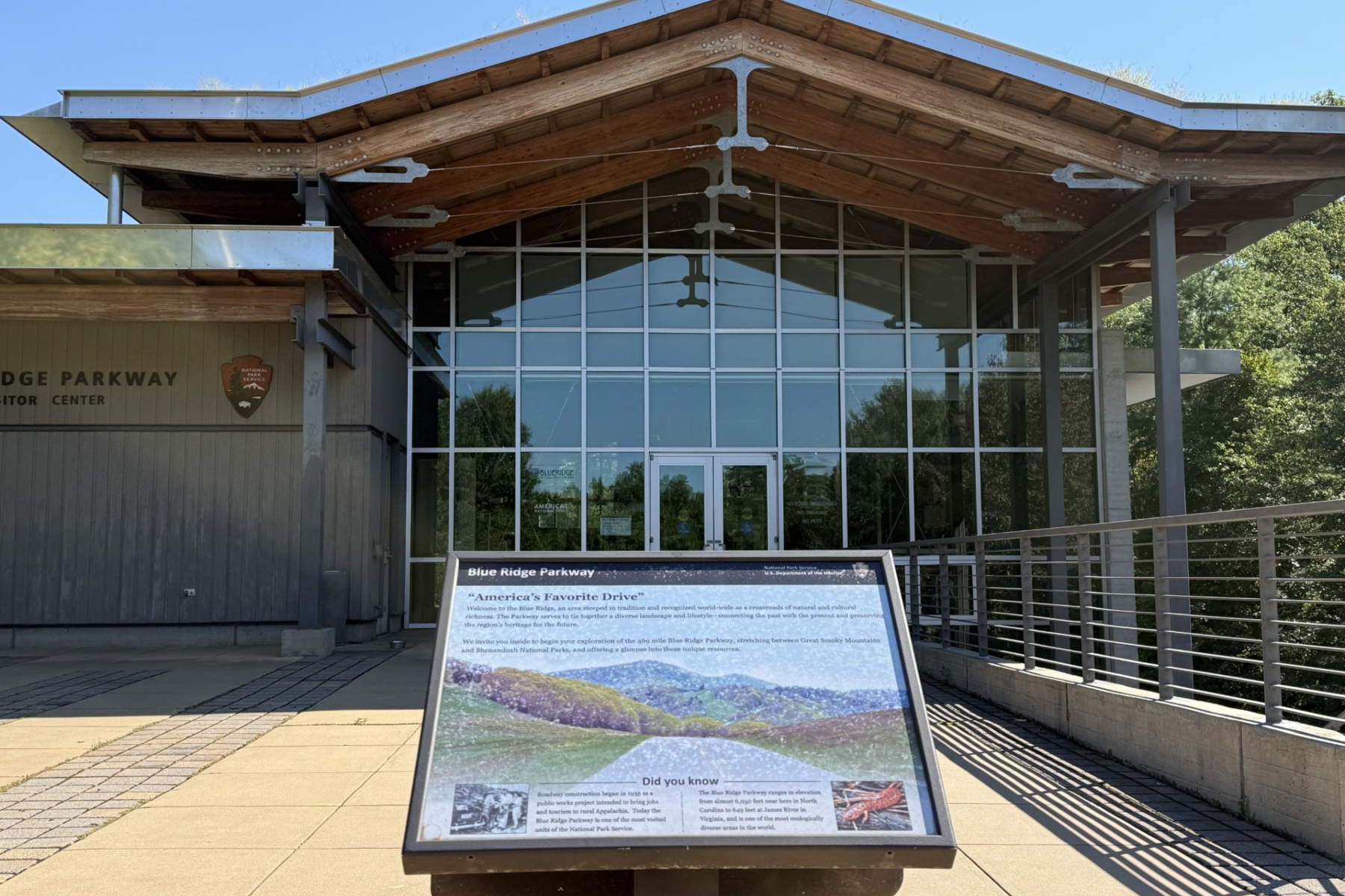 The Blue Ridge Parkway Visitor Center near Asheville features exhibits about the Parkway's natural and cultural history. A leaked National Park Service database identifies some Blue Ridge Parkway signs and interpretive exhibits for review.