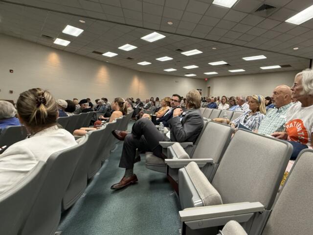 About 80 people signed up to speak during Wednesday’s North Carolina Department of Health and Human Services public hearing at Ferguson Auditorium at Asheville-Buncombe Technical Community College.