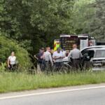 Emergency medical personnel and North Carolina State Highway Patrol troopers respond Tuesday morning, Aug. 4, 2026, to a serious crash on Pisgah Highway near Mountain Home Drive in Candler.