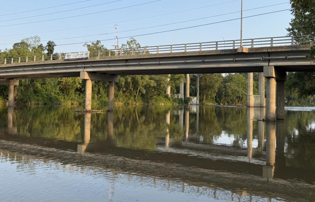 The Craven Street Bridge crosses the French Broad River in Asheville as construction on the I-26 Connector project prepares to move into the river.