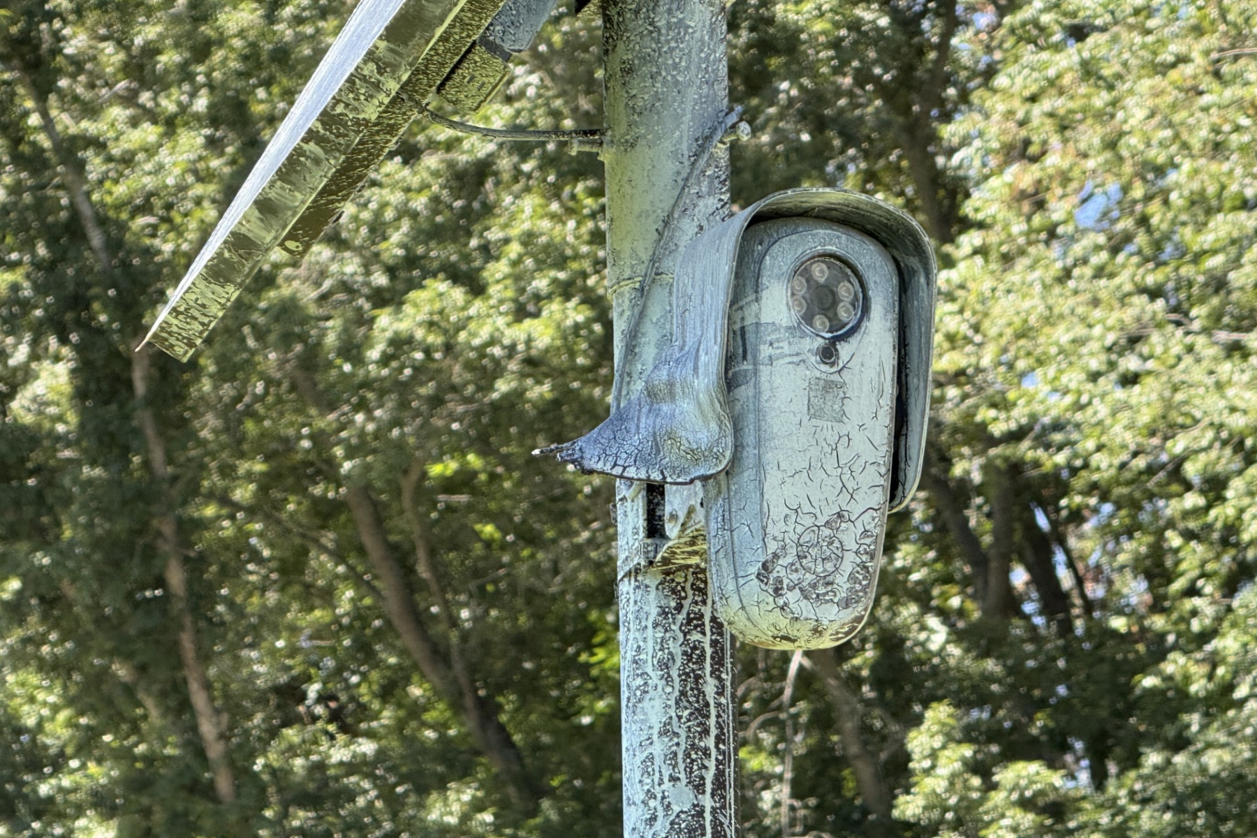 A Flock Safety automated license plate reader camera is pictured Aug. 24, 2026, at Carrier Park on Amboy Road in Asheville. Asheville City Council is scheduled to vote Tuesday on a resolution to terminate the city’s contract with Flock Safety.