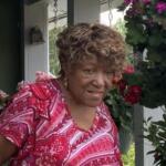 Barbara Payne, a longtime Shiloh resident, discusses concerns about development, preserving the neighborhood's history and keeping longtime residents rooted in the community during a neighborhood walk Wednesday, Aug. 12, 2026, in Asheville.