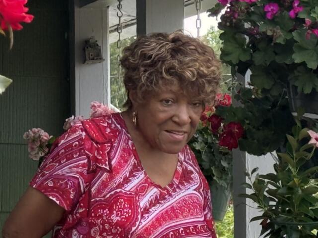 Barbara Payne, a longtime Shiloh resident, discusses concerns about development, preserving the neighborhood's history and keeping longtime residents rooted in the community during a neighborhood walk Wednesday, Aug. 12, 2026, in Asheville.