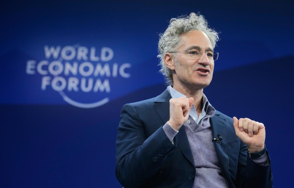 Alex Karp, CEO of the software firm Palantir Technologies speaks during the Annual Meeting of the World Economic Forum in Davos, Switzerland, Tuesday, Jan. 20, 2026. (AP Photo/Markus Schreiber)