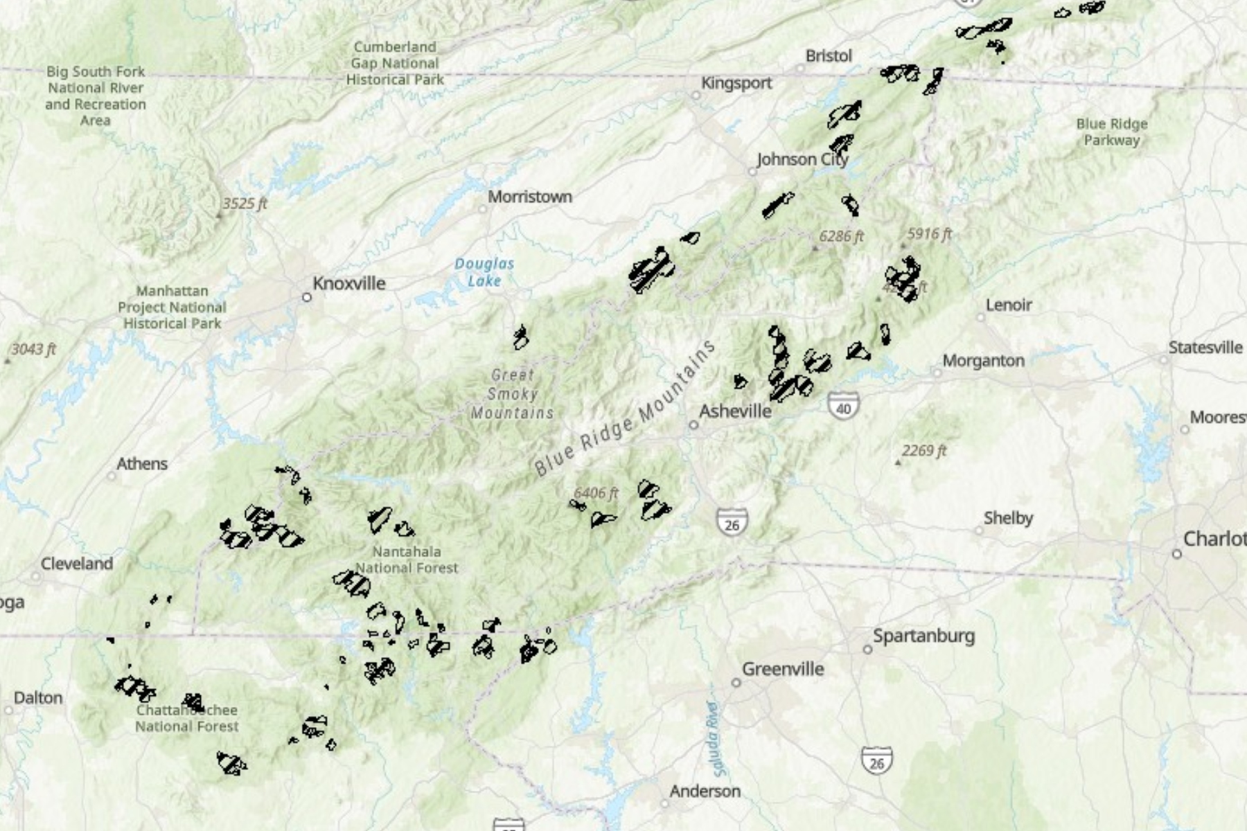 A map shows inventoried roadless areas in and around the Asheville area, including portions of the Pisgah and Nantahala national forests. The areas are among those covered by the federal Roadless Area Conservation Rule, which the U.S. Forest Service has proposed rescinding.