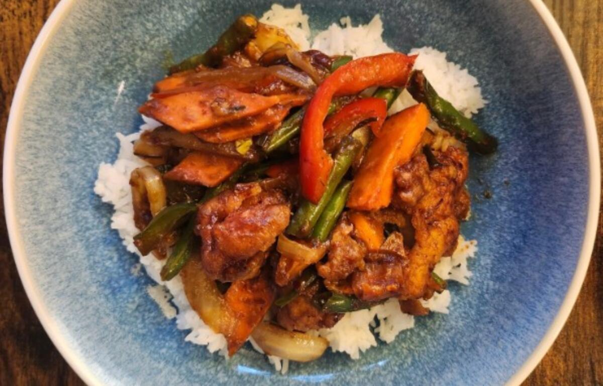 Suwana’s Thai Orchid’s Pad Prik Khing with catfish combines green beans, bell peppers, carrots and kaffir lime leaf in a rich Thai curry stir-fry sauce.