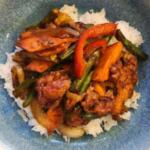 Suwana’s Thai Orchid’s Pad Prik Khing with catfish combines green beans, bell peppers, carrots and kaffir lime leaf in a rich Thai curry stir-fry sauce.