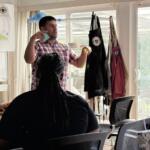 Marc Holaday, program manager for Service Members, Veterans and their Families engagement and outreach at the Governor’s Institute, speaks during the North Carolina Governor’s Working Group Collaboration Lab on Tuesday, Aug. 18, 2026, at the Veterans Healing Farm in Mills River.