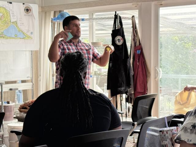 Marc Holaday, program manager for Service Members, Veterans and their Families engagement and outreach at the Governor’s Institute, speaks during the North Carolina Governor’s Working Group Collaboration Lab on Tuesday, Aug. 18, 2026, at the Veterans Healing Farm in Mills River.