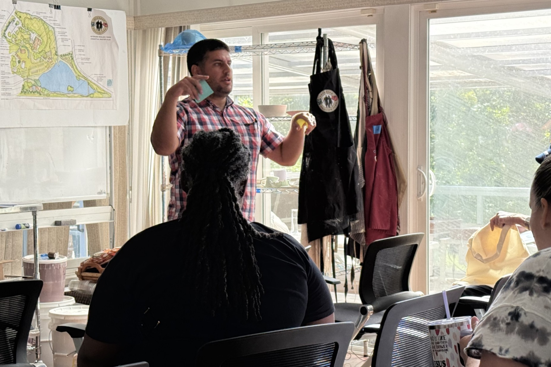 Marc Holaday, program manager for Service Members, Veterans and their Families engagement and outreach at the Governor’s Institute, speaks during the North Carolina Governor’s Working Group Collaboration Lab on Tuesday, Aug. 18, 2026, at the Veterans Healing Farm in Mills River.