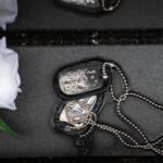 Military dog tags are pictured at the Vietnam Veterans Memorial on Memorial Day, Monday, May 25, 2026, in Washington. (AP Photo/Allison Robbert)
