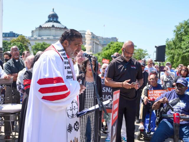 Activists with the Poor People's Campaign led by Rev. William Barber, left, protest against spending reductions across Medicaid, food stamps and federal aid in President Donald Trump's spending and tax bill being worked on by Senate Republicans this week, outside the Supreme Court in Washington, Monday, June 2, 2025. (AP Photo/J. Scott Applewhite)