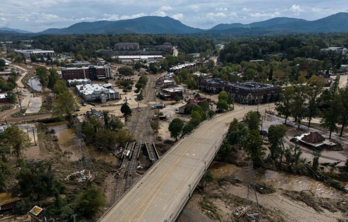 Debris is seen in the aftermath of Hurricane Helene, Monday, Sept. 30, 2024, in Asheville, N.C. (AP Photo/Mike Stewart)