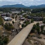 Debris is seen in the aftermath of Hurricane Helene, Monday, Sept. 30, 2024, in Asheville, N.C. (AP Photo/Mike Stewart)