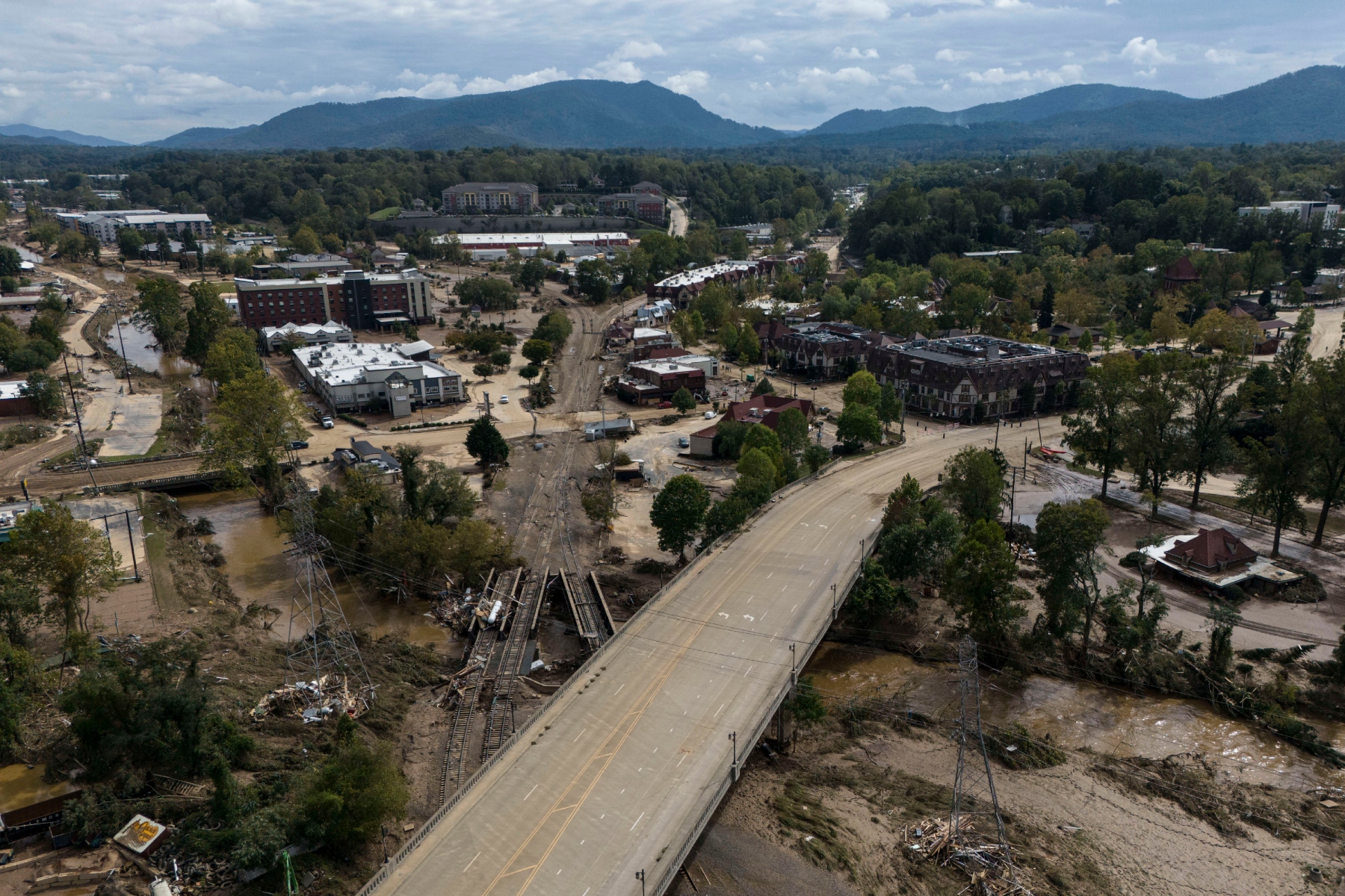 Debris is seen in the aftermath of Hurricane Helene, Monday, Sept. 30, 2024, in Asheville, N.C. (AP Photo/Mike Stewart)