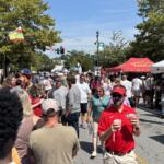 Festivalgoers enjoy the sights, sounds and food at the annual North Carolina Apple Festival in downtown Hendersonville.