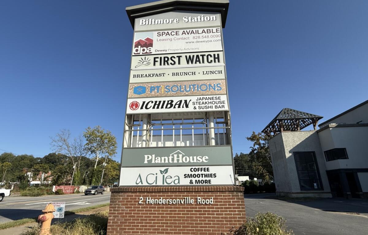 The Biltmore Station sign stands in front of the property at 2 Hendersonville Road, where Drury Hotels is proposing a 210-room hotel.