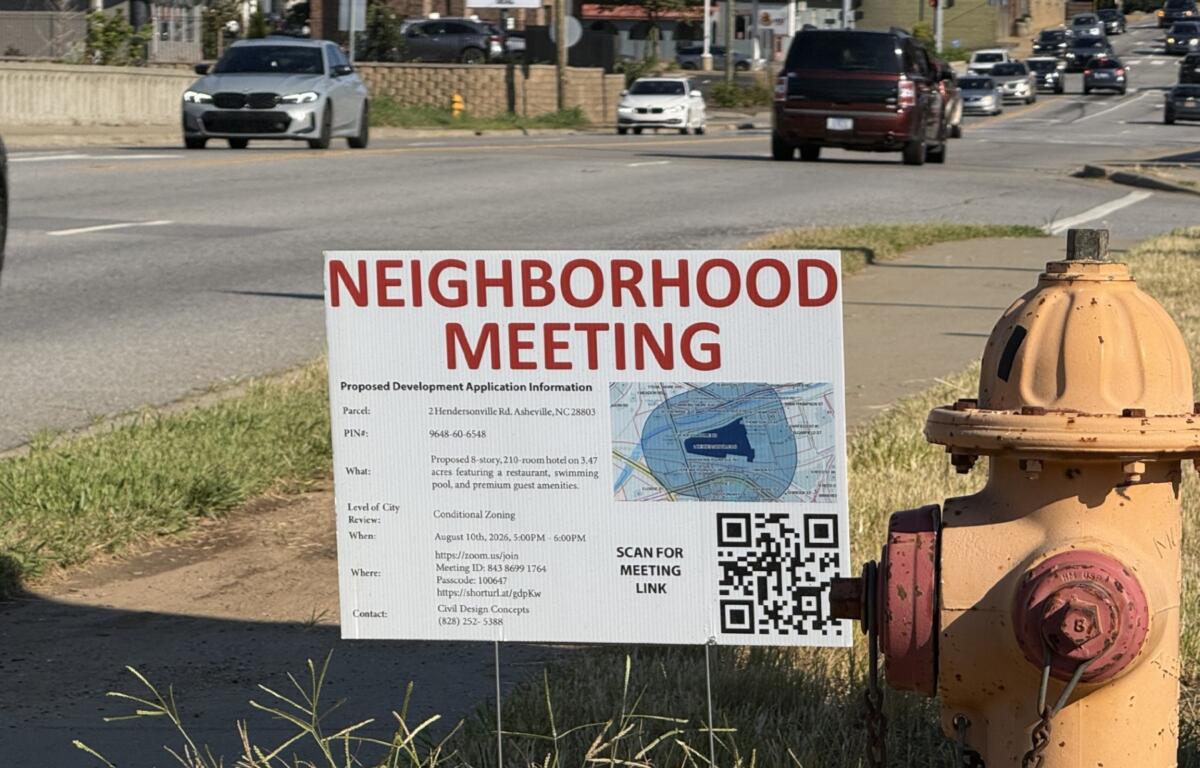 A special meeting notice for the proposed Drury Biltmore Station Hotel is posted as the project moves through Asheville's conditional zoning review process.