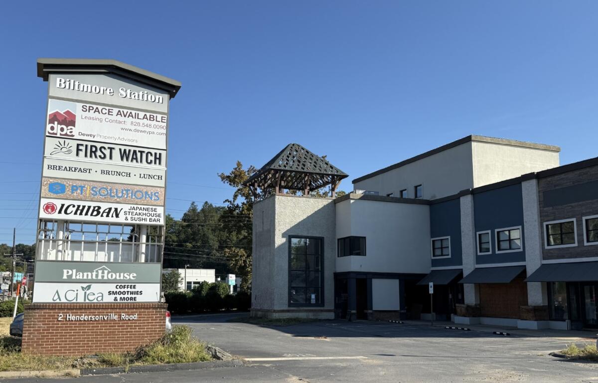 The Biltmore Station sign stands in front of the property at 2 Hendersonville Road, where Drury Hotels is proposing a 210-room hotel.