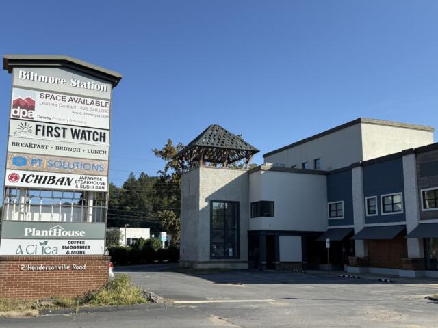 The Biltmore Station sign stands in front of the property at 2 Hendersonville Road, where Drury Hotels is proposing a 210-room hotel.