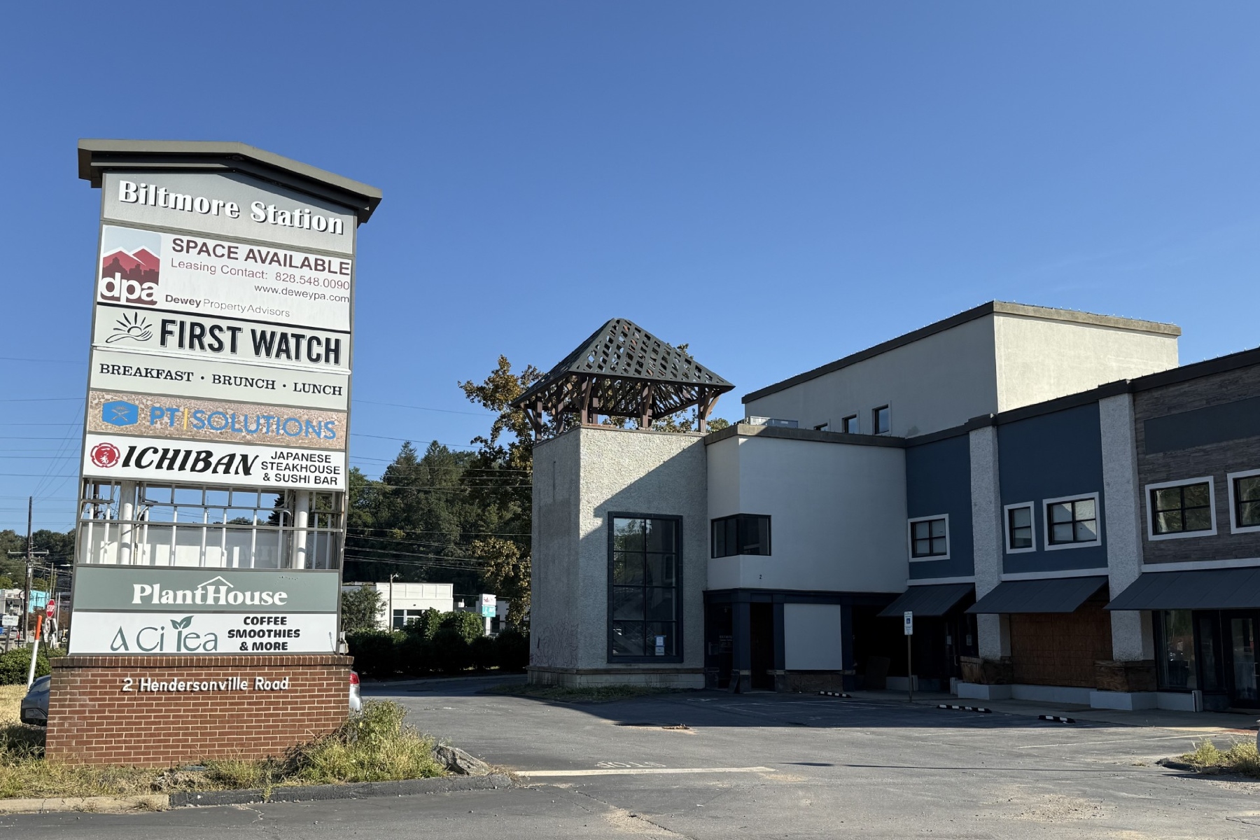 The Biltmore Station sign stands in front of the property at 2 Hendersonville Road, where Drury Hotels is proposing a 210-room hotel.