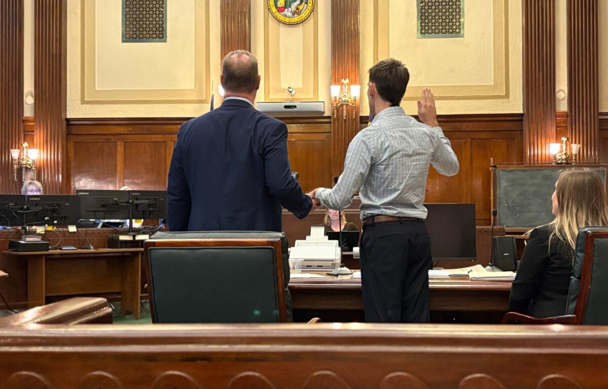 Matthew Fenner is sworn in Monday in Buncombe County Superior Court before delivering a victim-impact statement in the case against Word of Faith Fellowship leader Brooke Covington.