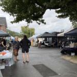 Vendors and visitors gather at the Swannanoa Market, part of the Swannanoa Resilience Hub’s efforts to support local businesses and bring the community together nearly two years after Tropical Storm Helene.