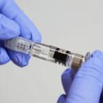 FILE - A certified medical assistant holds a syringe for a flu vaccine at a clinic in Seattle, on Sept. 10, 2025. (AP Photo/Lindsey Wasson, File)