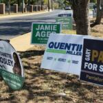 Campaign signs line a roadside ahead of the Nov. 3 election