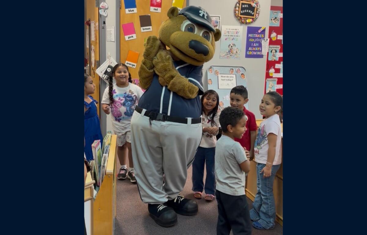 Ted E. Tourist, the Asheville Tourists’ mascot, surprises kindergartners at Johnston Elementary School during the school’s annual Bear Breakfast on Friday, Oct. 2, 2026.