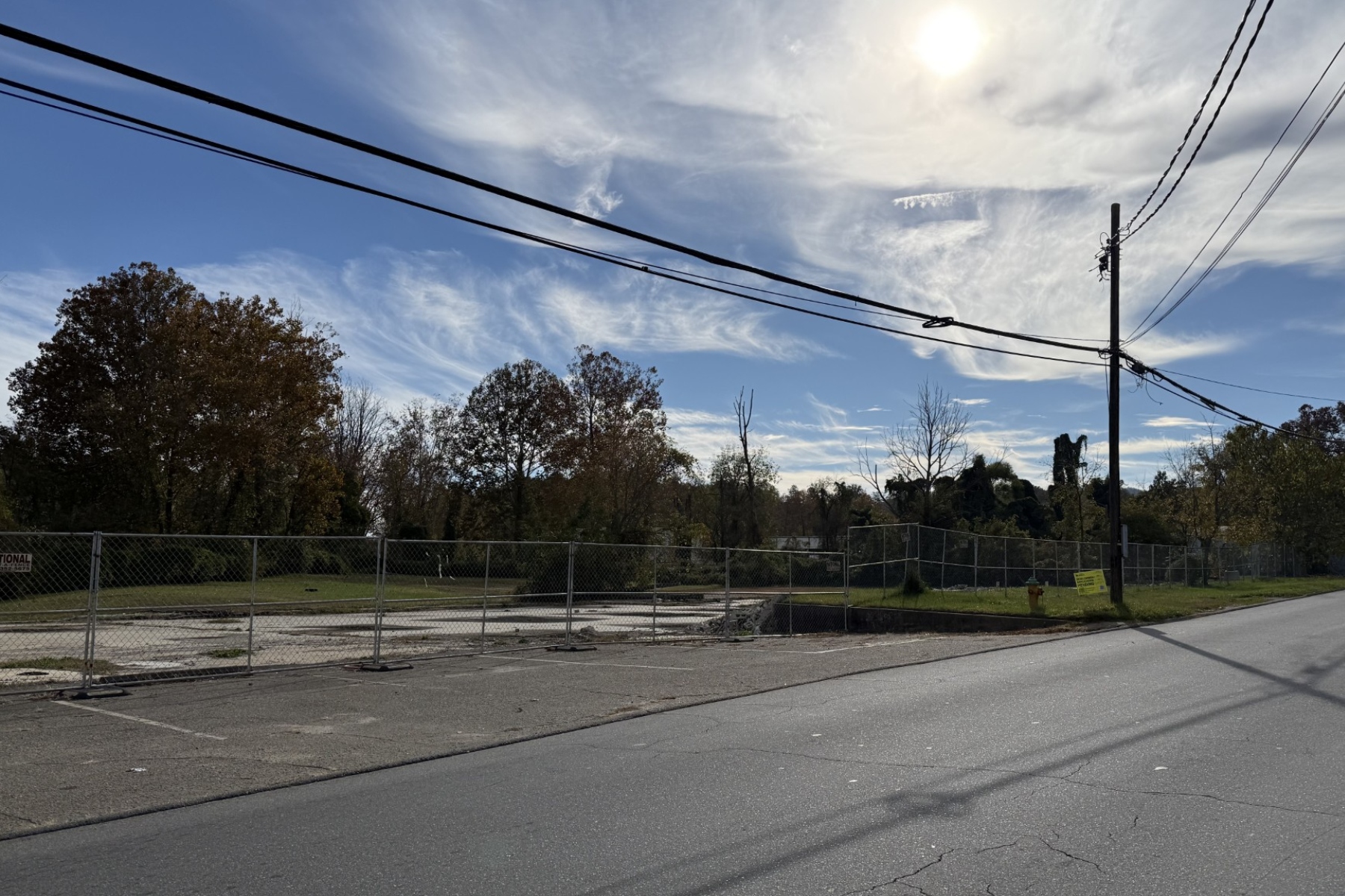 The vacant property at 21 London Road in Asheville is the proposed site of a seven-story, 252-unit apartment building. Asheville City Council approved an expansion of the project in a 4-3 vote Tuesday, Oct. 27, 2026, despite concerns about flooding.