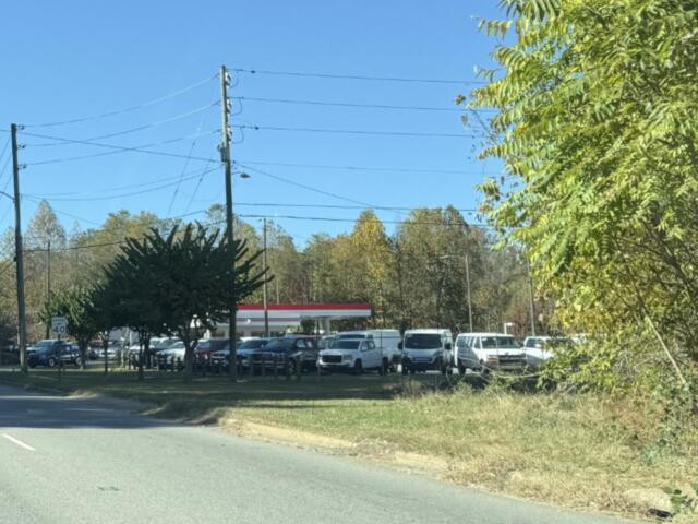 A stretch of Patton Avenue near Old Haywood Road in Asheville has no sidewalk along the roadside. A proposed transportation project would fill sidewalk gaps between the western end of Old Haywood Road and Johnston Boulevard.