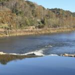 Taylor's Wave creates a standing wave on the French Broad River in Woodfin. The $4.8 million whitewater attraction opened in October 2026 after years of planning and construction delays caused by Tropical Storm Helene.