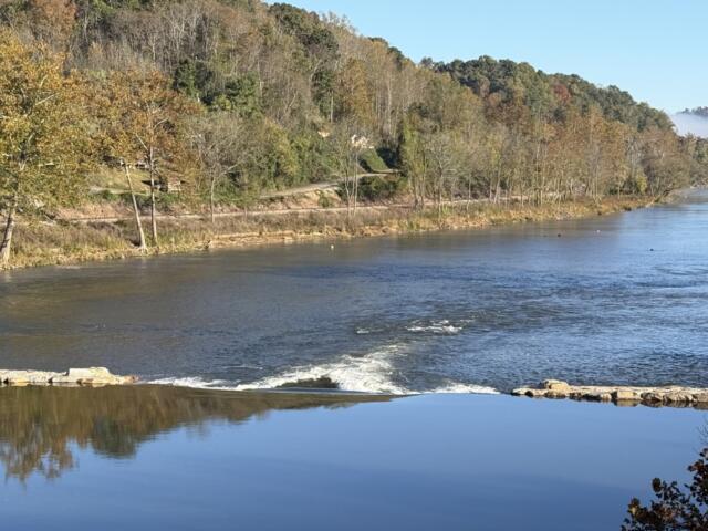 Taylor's Wave creates a standing wave on the French Broad River in Woodfin. The $4.8 million whitewater attraction opened in October 2026 after years of planning and construction delays caused by Tropical Storm Helene.