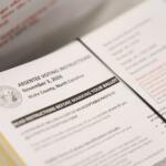 Absentee voting instructions for mail-in ballots are seen at the Wake County Board of Elections on Thursday, Sept. 3, 2026, in Raleigh, N.C. (AP Photo/Matt Ramey)